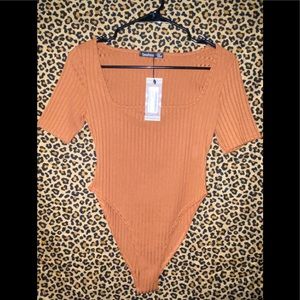 Dark tan mid sleeve body suit